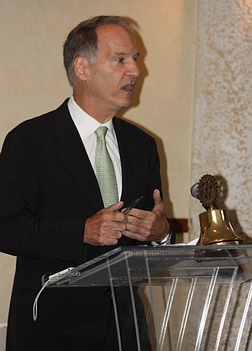 Frank Schneiger talks to Rotary members about how to cut the cost of crime in the territory.