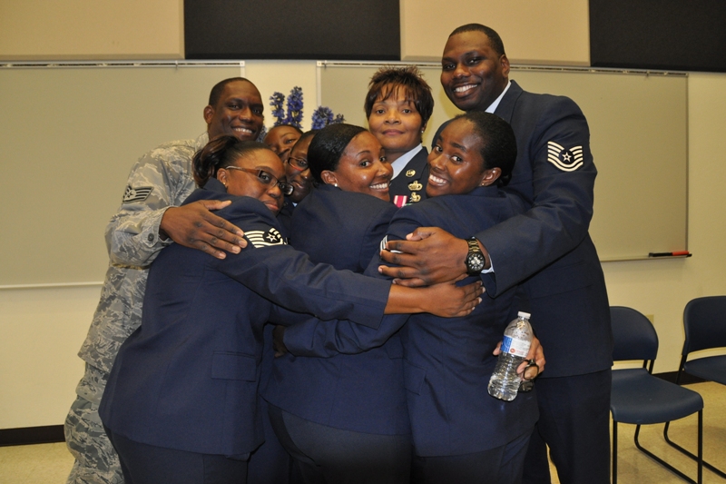 State Command Chief Master Sgt. Willette F. Lewis surrounded by her "children," members of the V.I. Air National Guard.