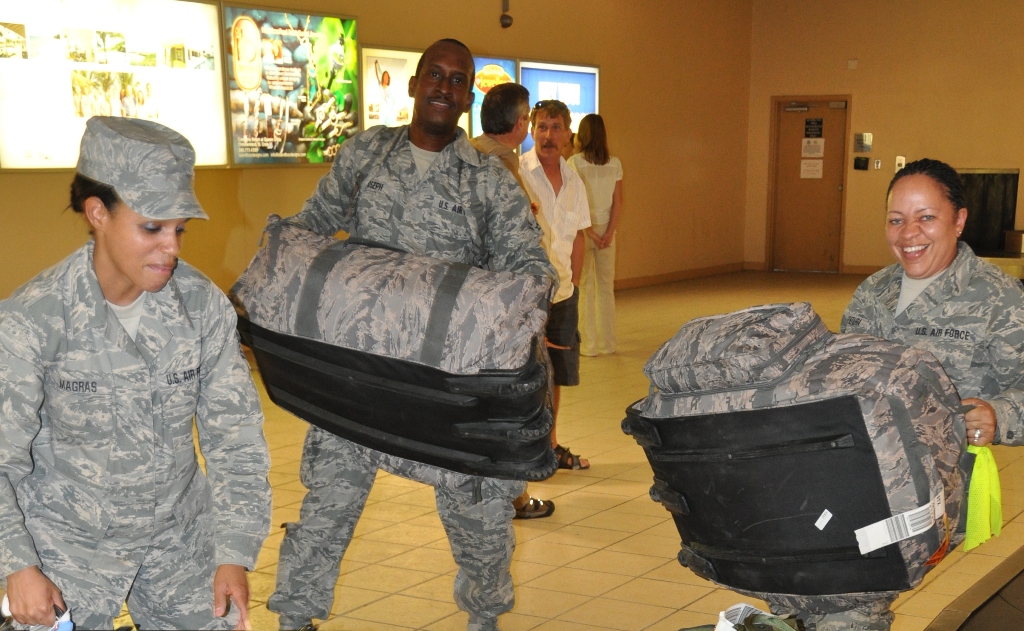 Tech. Sgt. Michelle Magras, Airman 1st Class Roy Joseph, and Tech. Sgt. Aretha Ventura arrived home early from their deployment last Friday. 