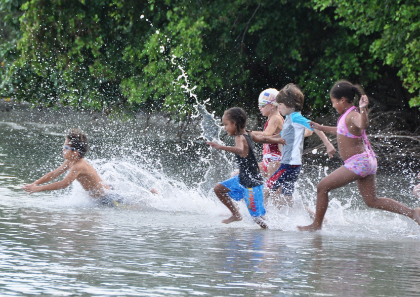 It's a wet and wild start for kids in the 7-8 year-old division at Chenay Bay.