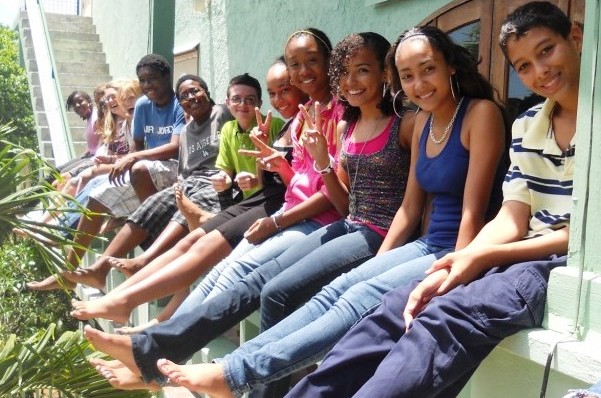 International Academy students show off their bare feet.
