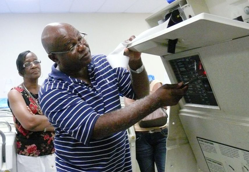 Patrick Phillips of P and P Communications demonstrates how voting machines are tested and operated.