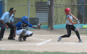 A St. Croix Educational Complex batter swings against Tortola’s Elmore Stoutt High School.