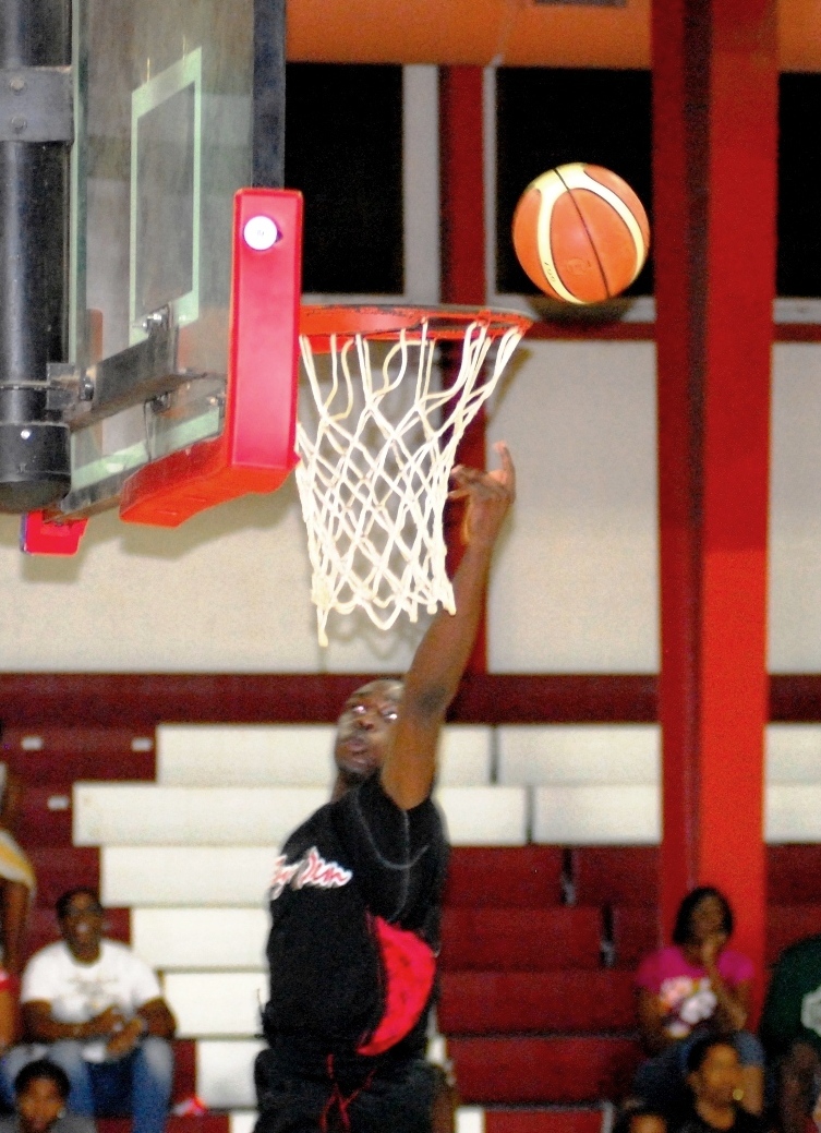 Boys Dem's Rasheed Swanston scores an easy two in the fourth period. 