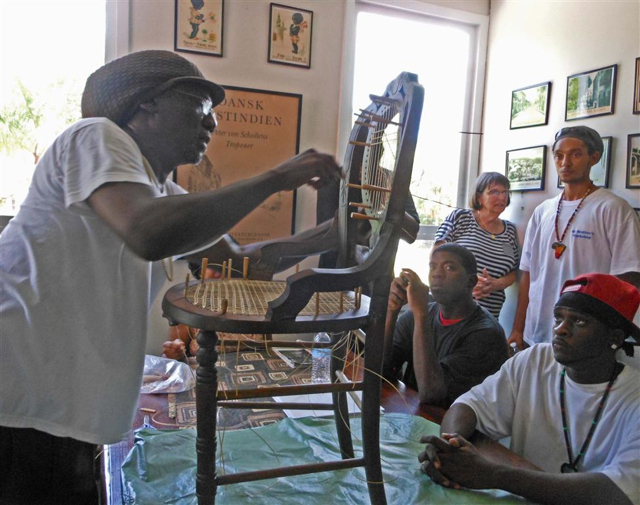 All eyes are on Kenneth Richards as he demonstrates caning. 