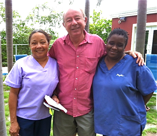 From left, Rhea Vasconcellos, Joe Aubain and senior kennel technician Phyllis Rogers at Saturday's work party.