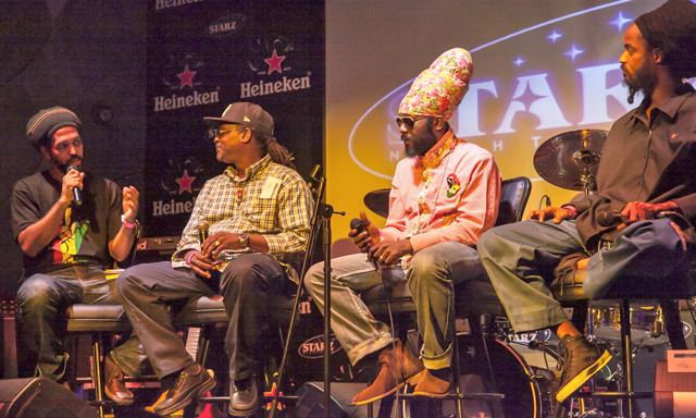 From left, moderator Laurent 'Trippy' Alfred, reggae radio expert Ras Regg, and artists Ras Attitude and Melame Gange discuss consciousness in reggae music. (Photo by Aisha-Zakiya Boyd)