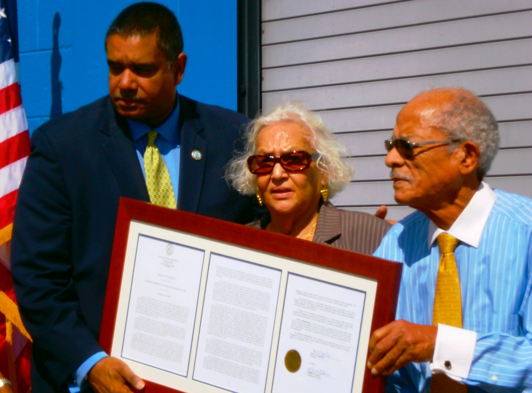 From left, Gov. John deJongh Jr., Faye Francois and Donald C. Francois holding the Proclamation of Donald C. Francois Day.