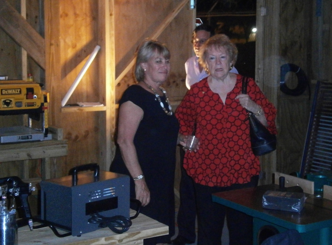 Rotarians Sue Boland and Donna Liska view the newly donated equipment.