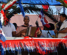 Musicians on the back of a float in the Dominicanos parade.
