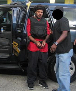 Jose M. Rivera Jr. in custody at Rohlsen airport. (VIPD photo)