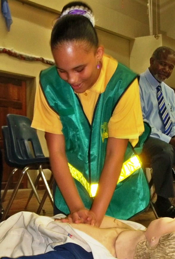 Solly Latigua practices CPR as observed by Al Javois, VITEMA’s deputy director for preparedness. 