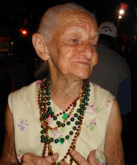 Frenchtown matriarch Elizabeth "Lelell" Aubain sports her Mardi Gras beads.