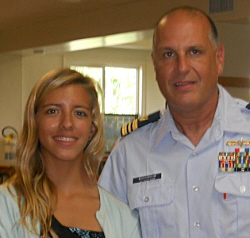 Nikole Barnes with Coast Guard Lt. Cmdr. Daniel Buchsbaum.