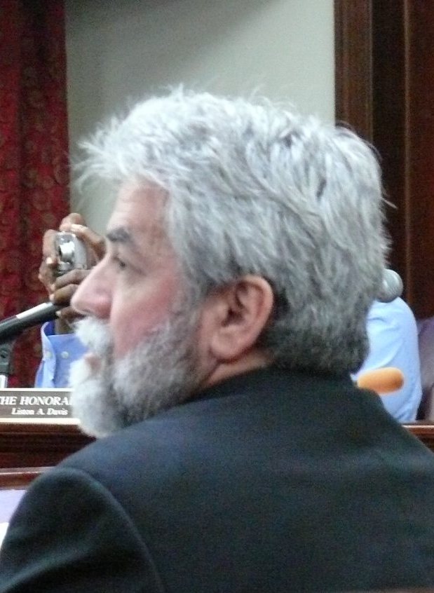 Human Services Commissioner Chris Finch before a prior committee hearing (File photo).