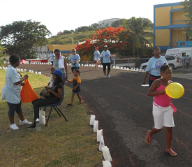 Participants walk the track at Charlotte Amalie High School during the 11th Relay for Life.  (Laurel Kaufmann photo)