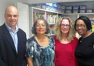 (from left) Chevron's Hector Enfante, Beverly Chongasing, Dee Baecher-Brown and Carol Theodore at Monday's donation ceremony. 