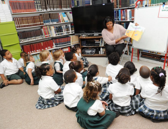 Cecile deJongh reads Dr. Seuss at All Saints Cathedral School.