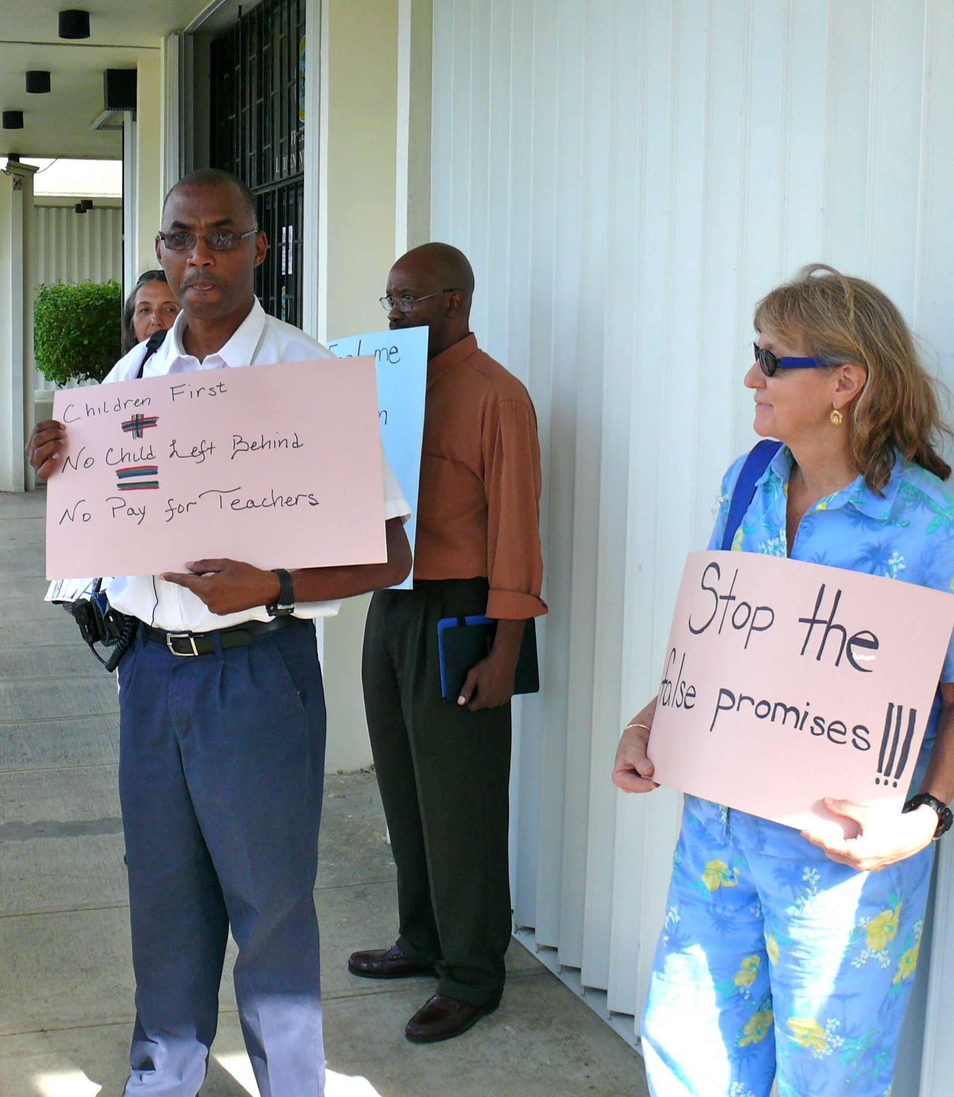 St. Croix Federation of Teachers President James Howell and several fellow union members protesting outside the Legislature in Frederiksted Thursday.