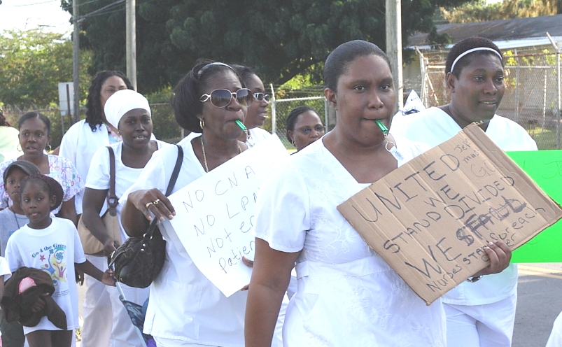 More than 100 nurses protested the recent layoffs at Juan F. Luis Hospital Thursday (Photo by Justin Shatwell).