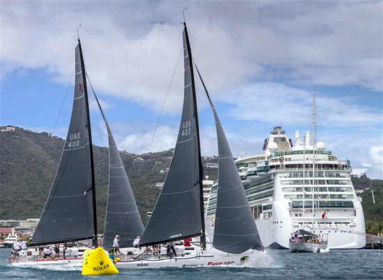 Blade (front) and Magnitude 400 zip past a cruise ship in St. Thomas harbor; click photo to enlarge. (Photo courtesy Rolex / Ingrid Abery)