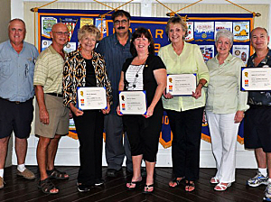 (From left) Rotarians Dave Carlson, Bruce Munro, Beverly Biziewski, Patrick Pearson, Marilyn Pearson, Diana White, Robert Schlesinger.