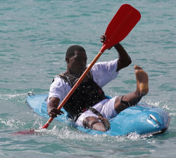 A competitor tries to keep his boat upright, and himself out of the ocean.