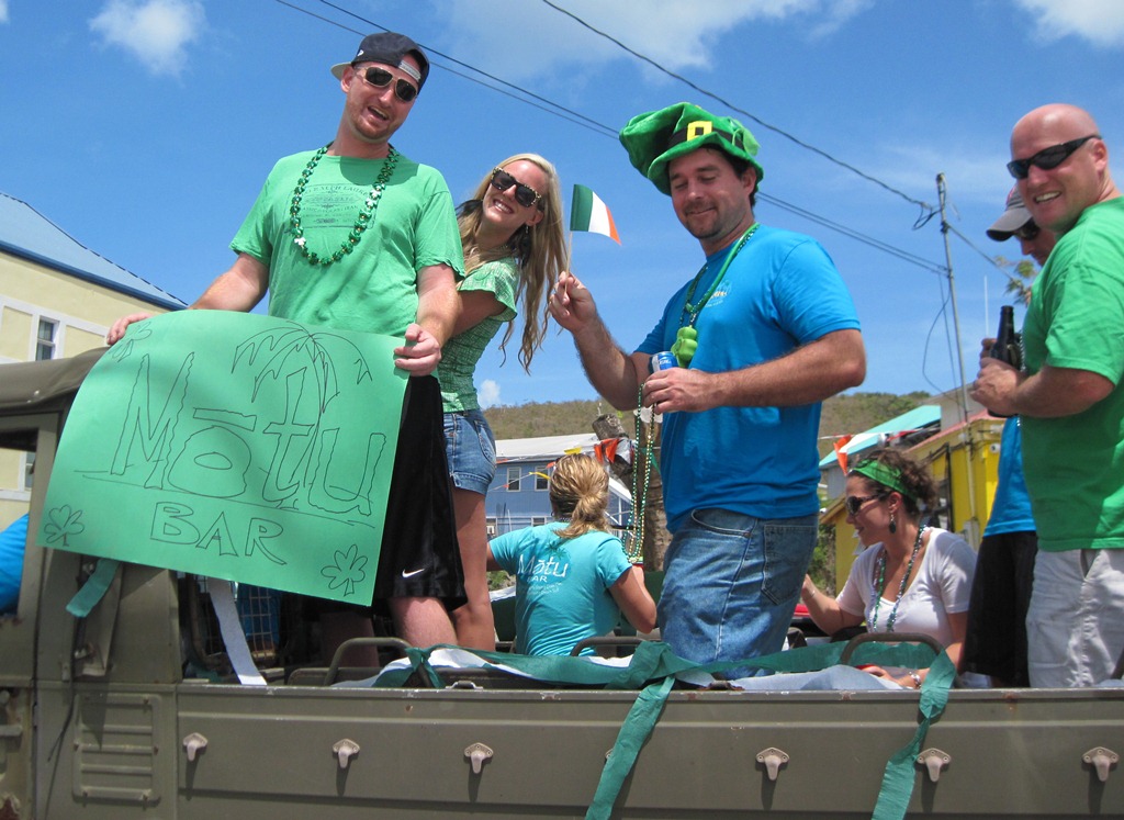 Group from Motu Bar celebrate the annual smallest St. Patrick's Day parade.