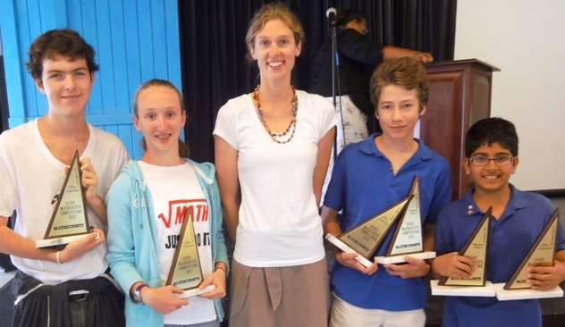 V.I. MATHCOUNTS champions from left: Ethan Dean and Sierra Van Allen of Country Day, coach Rachel Newman; Nicholas Midler and Manav Thandani of Antilles School.