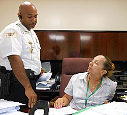Taxicab Commission Chief Enforcement Office Javier Estrill (left) and director Judith Wheatley.