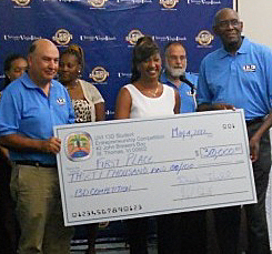 UVI Professor Glenn Metts (from left), winner Patricia Rogers, and UVI President David Hall.