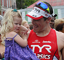 Men's winner Andy Potts with his smallest fan, daughter Sloane.