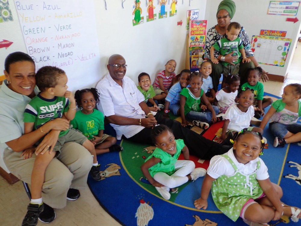 St. Croix Administrator Dodson James participates in Read for the Record at the Golden Rock Head Start Center.