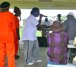 Inmate Rinel "Cheeks" Ferdinand gets the crowd jumping Friday.