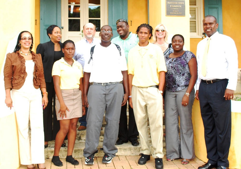 Contest winners in front, Miracle Nibbs, left, Latroy Charles and J'Quan Registe, are surrounded by, also from left to right, JAG-VI career specialist Josette Illis; judges Jennifer Matarangas-King, Scott Bradley, Jason Charles and Lisa Hamilton; career specialist Nisha Clavier; and Commissioner of Labor Albert Bryan Jr.