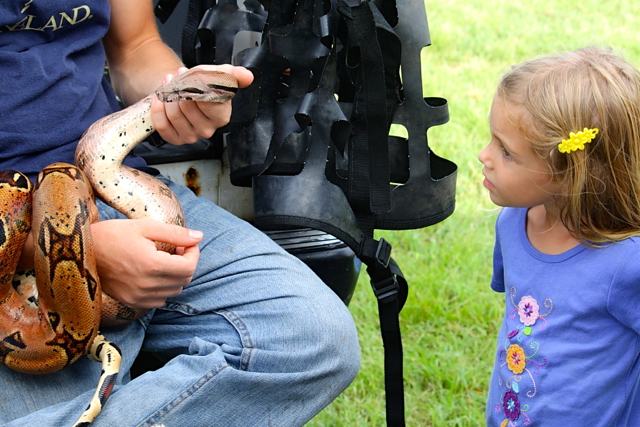 Marina Gasperi comes face to face with a boa constrictor at the petting zoo.