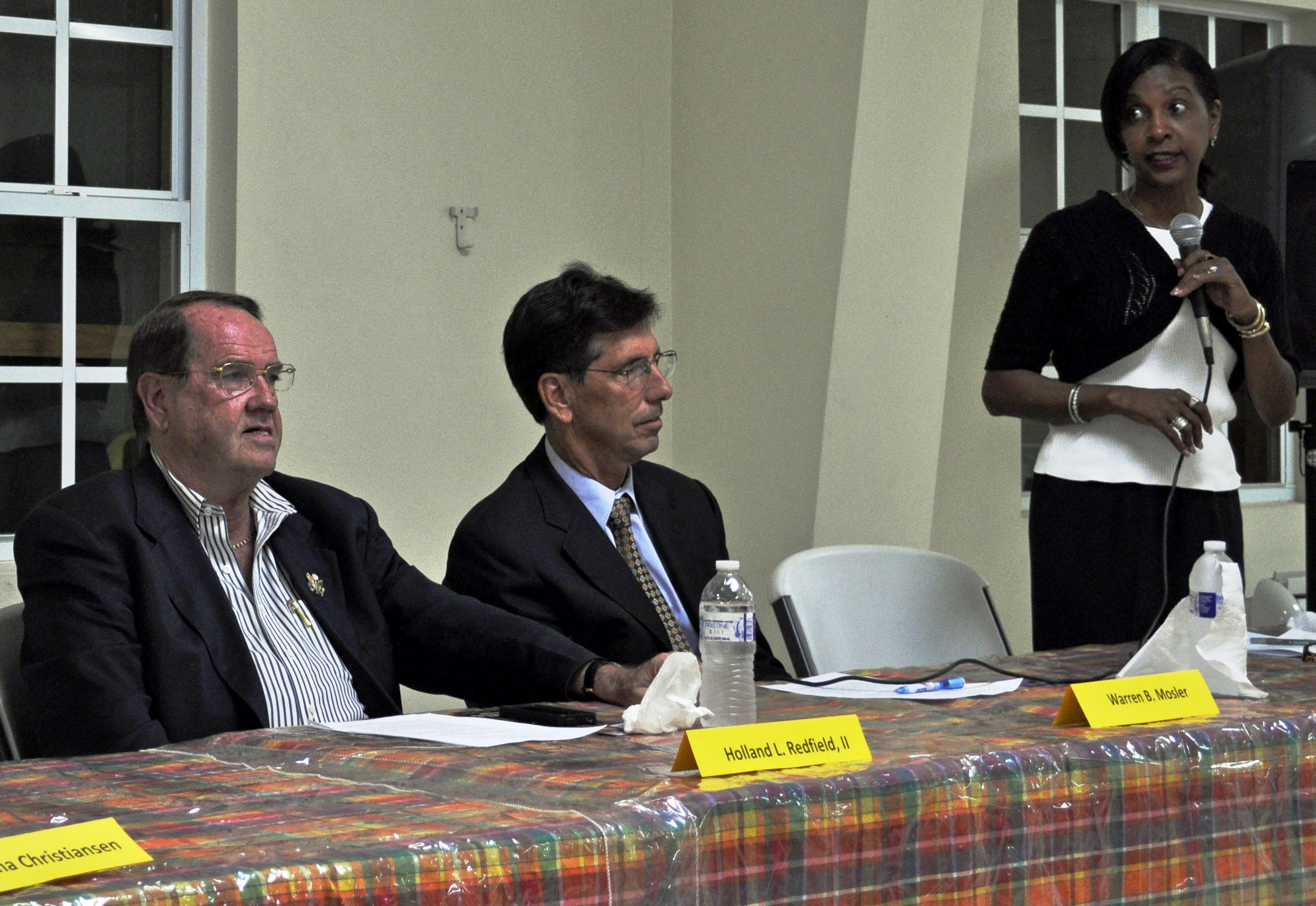 Congressional delegate candidates Holland Redfield, Warren Mosler and Norma Pickard Samuel at Wednesday's forum in Frederiksted.