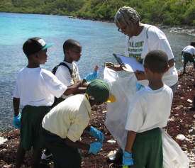 Third grade teacher Brenda Brown with her students at Haulover Bay.