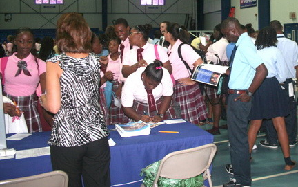Students from a variety of St. Thomas high schools various high schools check out offerings at a recent college fair sponsored by Antilles School.