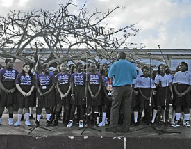 Choir director Malvern Gumbs diects the Addelita Cancryn concert choir.