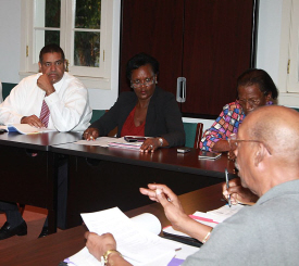 Gov. John deJongh Jr. (left) listens to Our Town Frederiksted members.