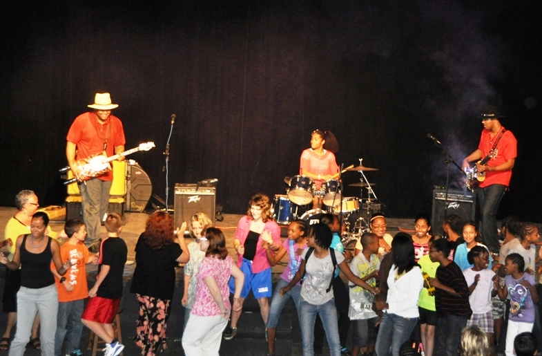 Students and teachers at the Good Hope School get down with The Homemade Jamz Blues Band.