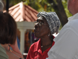 Asta Williams regales visitors with a story.