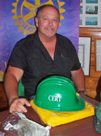 David Tourigny, St. Croix CERT coordinator, shows what a CERT backpack should contain.