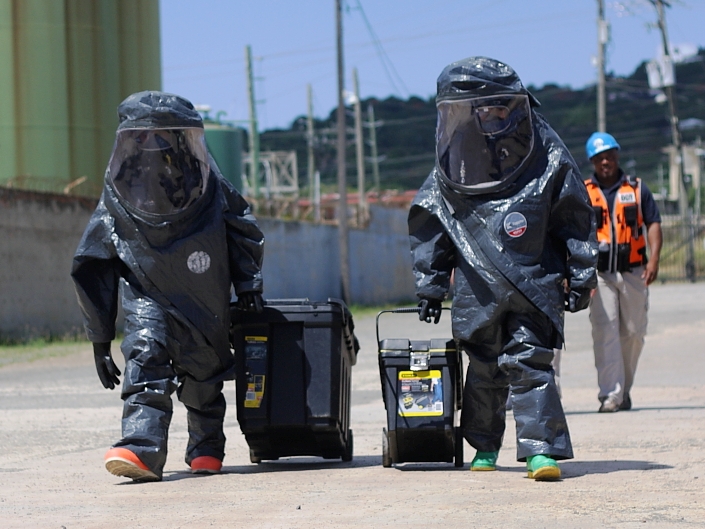 Staff Sergeant Luis Ayala and Sgt. Hector Colon of the 23rd CST participate in a disaster exercise at WAPA's Richmond plant.