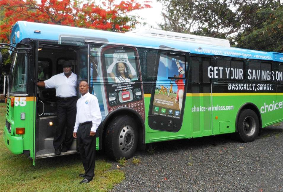 Bus driver Atkins Guishard, left, and DPW Commissioner Darryl Smalls.