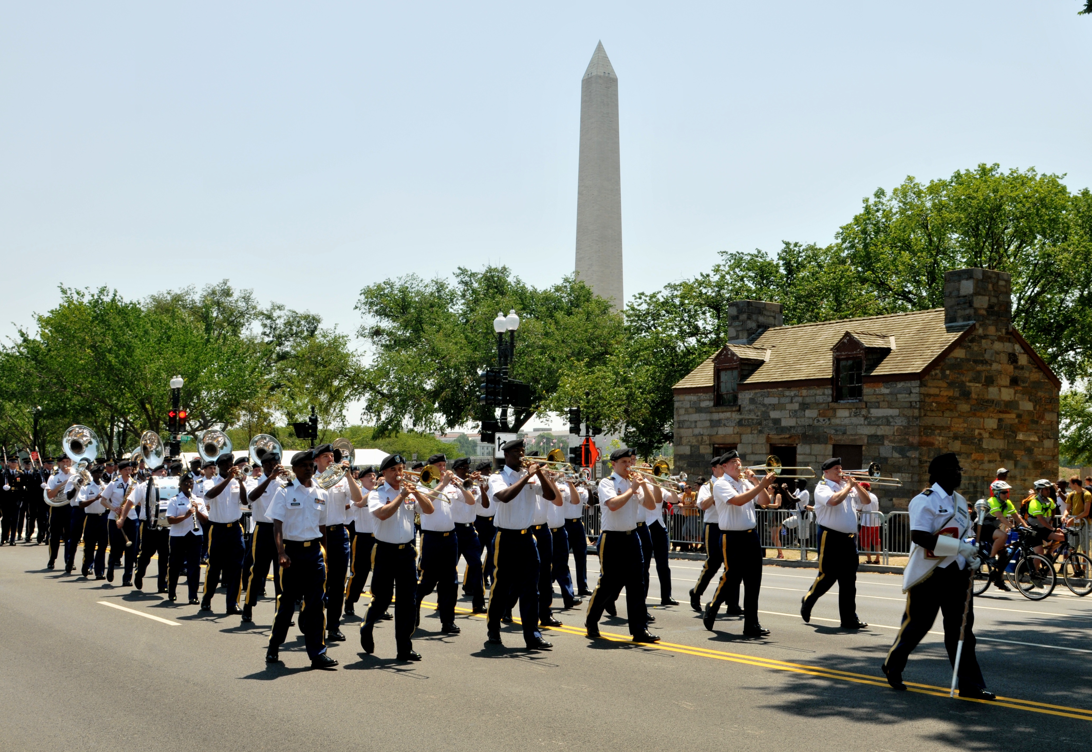 Sgt. 1st Class Monet Davis leads V.I. and D.C. band members in the nation's Independence Day parade in Washington on Wednesday.