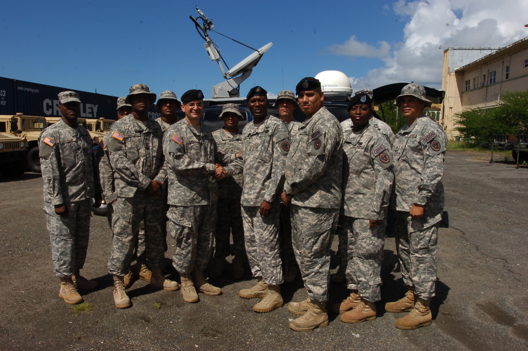 Puerto Rico National Guard Lt. Col. Carlos Rivera (center) thanks V.I. National Guard Maj. Kenneth S. Alleyne and the members of the VING's 23rd Civil Support Troop.
