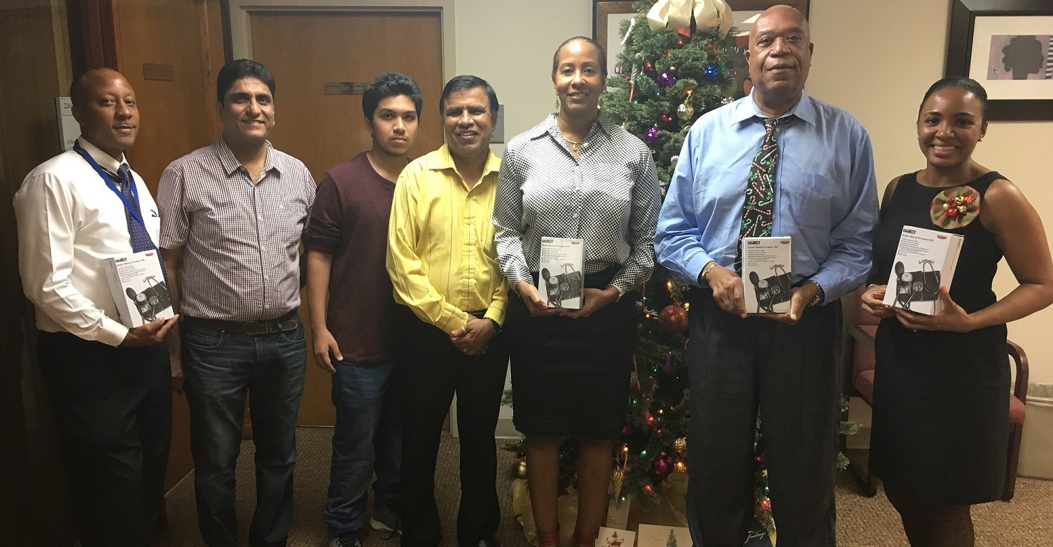 Members of the Sathya Sai Center with members of Schneider Regional Medical Center