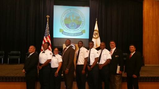 Graduation ceremony -- BOC graduates, instructors, Bureau of Corrections Director Rick Mullgrav, Felipe Rodriguez Jr., director of staff training at the Academy Federal Bureau of Prisons in Glynco, Georgia